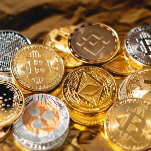 Pile di monete Bitcoin simbolo della crescita dell'ecosistema e dell'adozione globale nel 2026