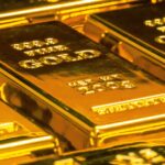 Lingotti d'oro simbolo degli investimenti istituzionali, articolo sulla revisione SEC delle regole di custodia crypto
